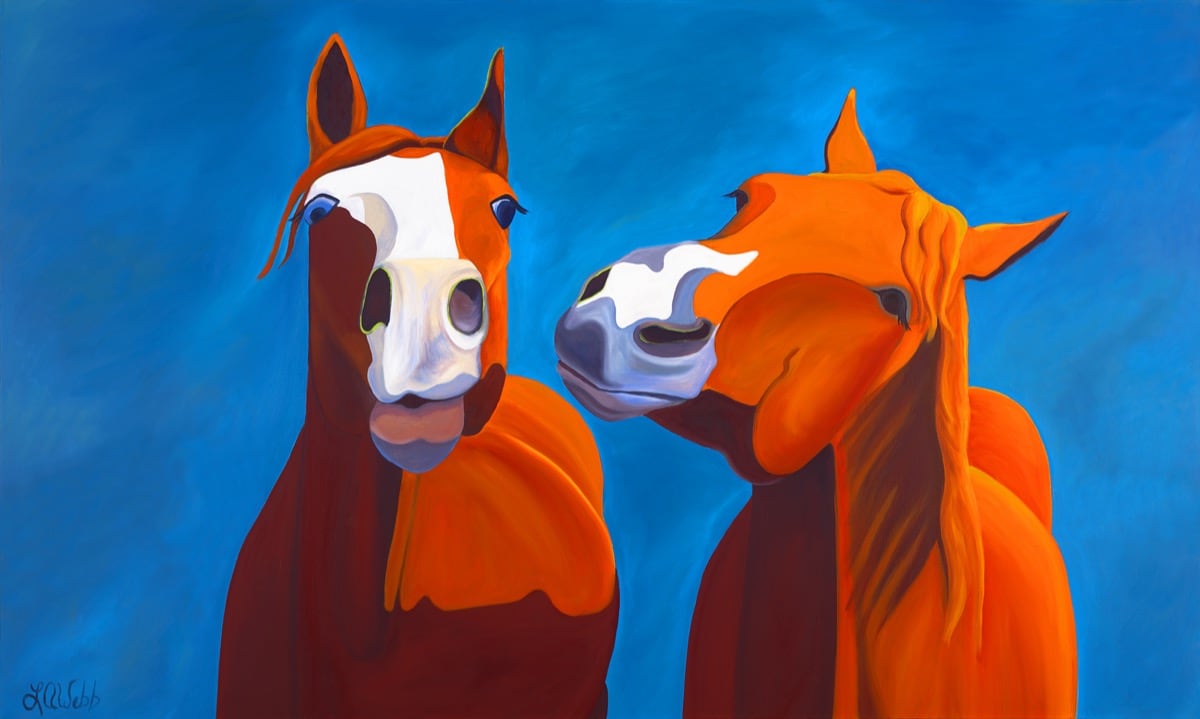 Two horses that look like they are talking to each other