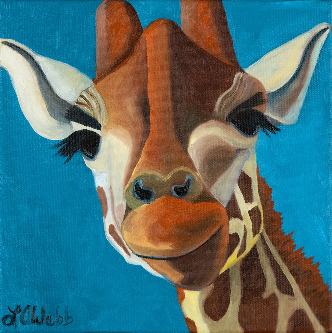 Stanley, a smiling giraffe